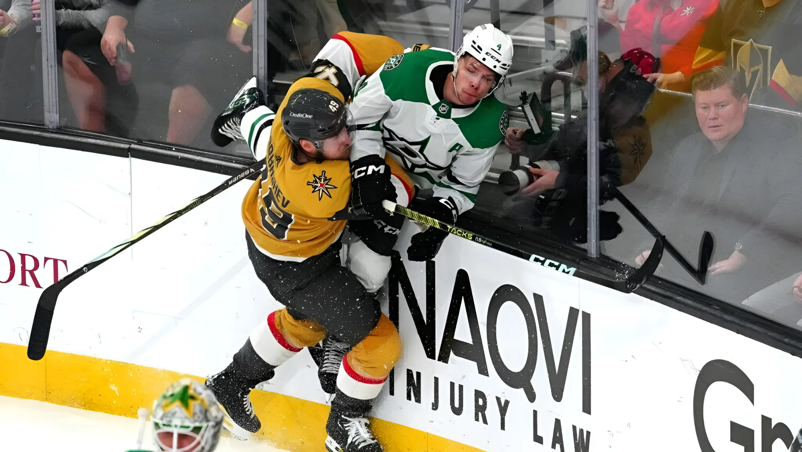 May 3, 2024; Las Vegas, Nevada, USA; Vegas Golden Knights center Ivan Barbashev (49) checks Dallas Stars defenseman Miro Heiskanen (4) during the third period of game six of the first round of the 2024 Stanley Cup Playoffs at T-Mobile Arena. Mandatory Credit: Stephen R. Sylvanie-USA TODAY Sports